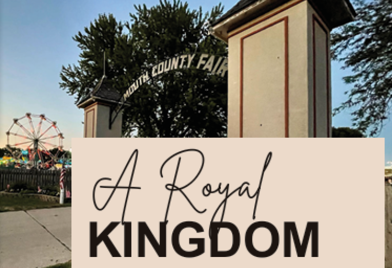 A far away shot of the Plymouth County Iowa Fair entrance gate, with the ferris wheel in the background. Over the photo are the words "A Royal Kingdom."