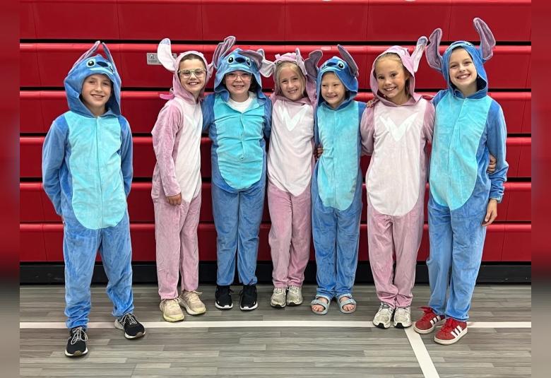 This group of students came dressed as Stitch as part of the week’s homecoming activities. Pictured from left, Glenn Colt, Hallie Willer, Ady Edwards, Evelyn Colt, Taya DeRocher, Andie DeRocher, and Macy Morehead. (Photo courtesy of A-W School)