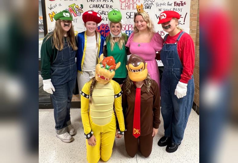 Mario World came to life at A-W as Tara Oltmanns, Tess Frerichs, Isabella Utesch, Kendra Olson, Brooklyn Hughes, Khai Utesch and Aniston Gravenish brought Nintendo characters to reality. (Photo courtesy of A-W School)