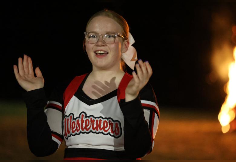 Westerner cheerleader Berklie Jacobson leads a cheer at the pep rally in Westfield to kick off homecoming week. (Photo courtesy of Tami Small)
